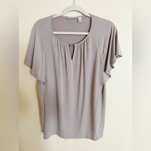 Susan Graver Liquid Knit flutter sleeve top with silver accent. Size Large